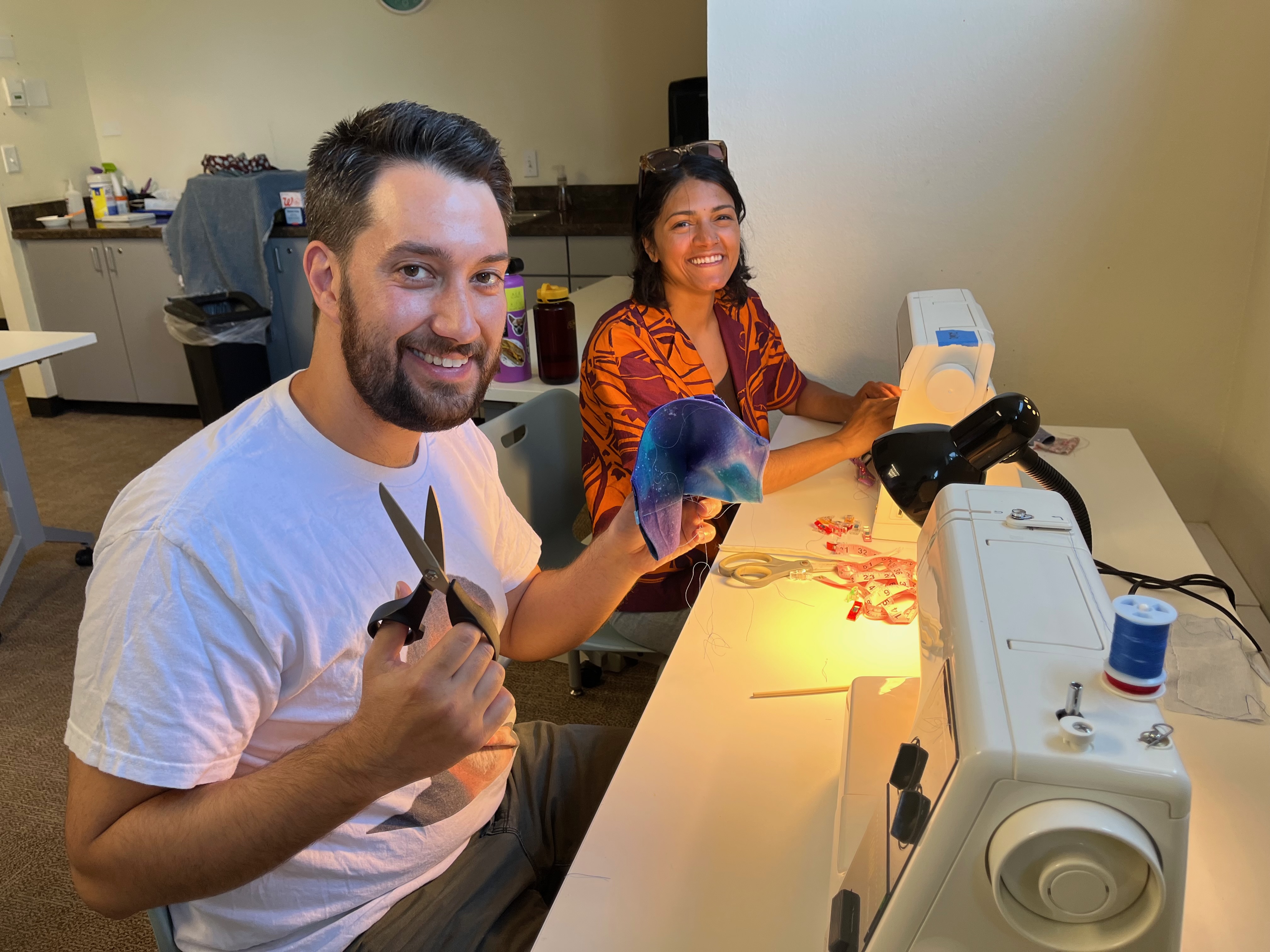 Students sewing during the class