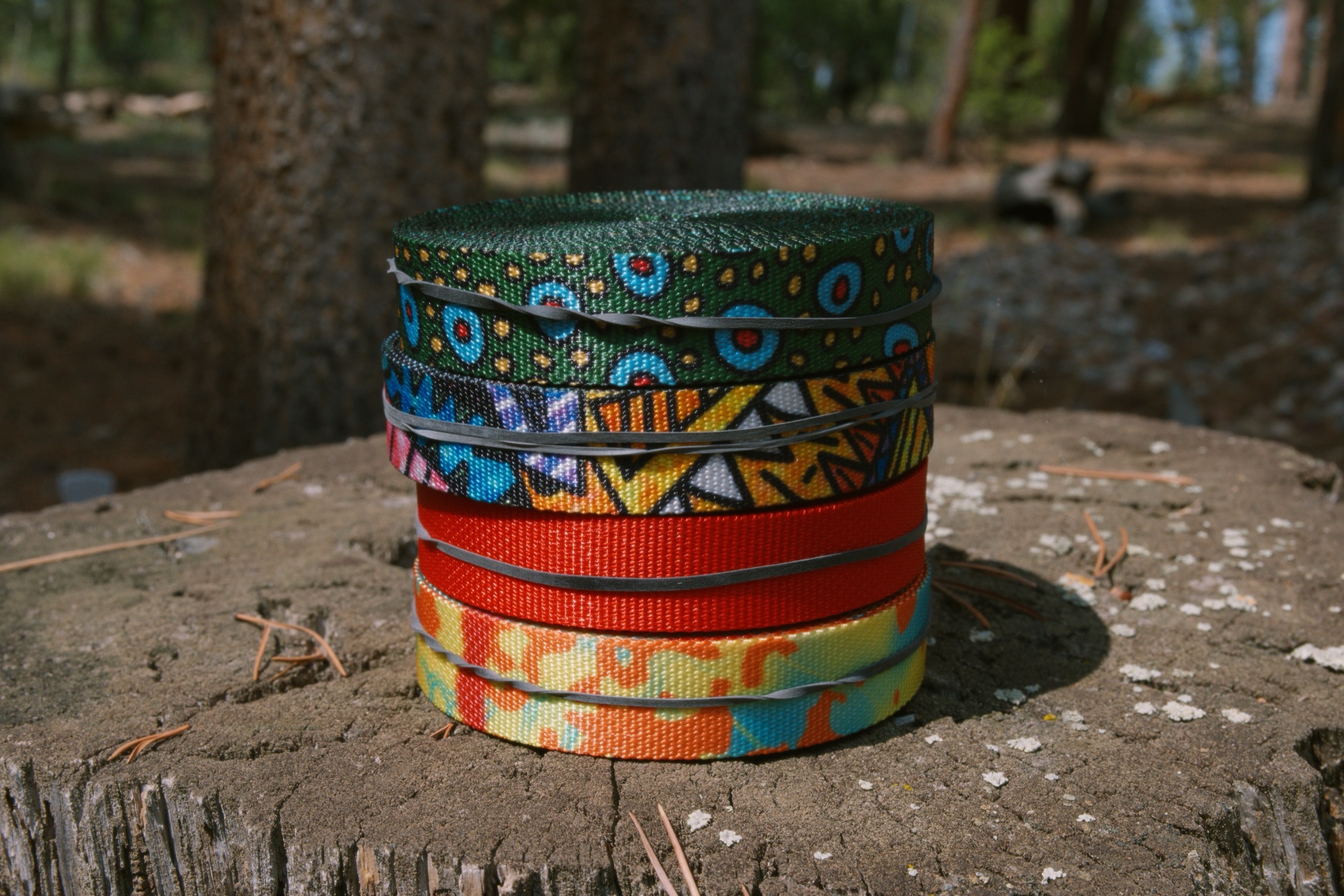 A stack of webbing rolls waiting to become collars